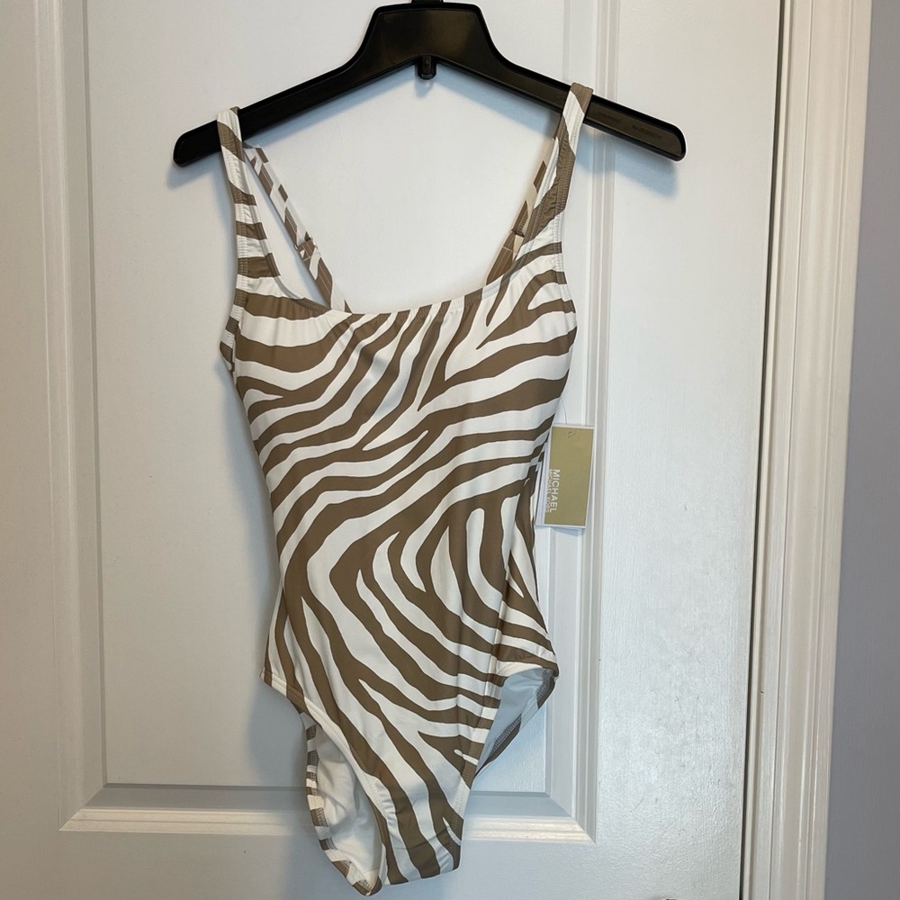 Michael Kors one piece swimwear new with tags and protective lining. Never worn!